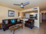 The living room has views of Aransas Bay and a flat screen TV